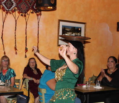 Hazar, dancing for donations to Next Door Solution to Domestic Violence